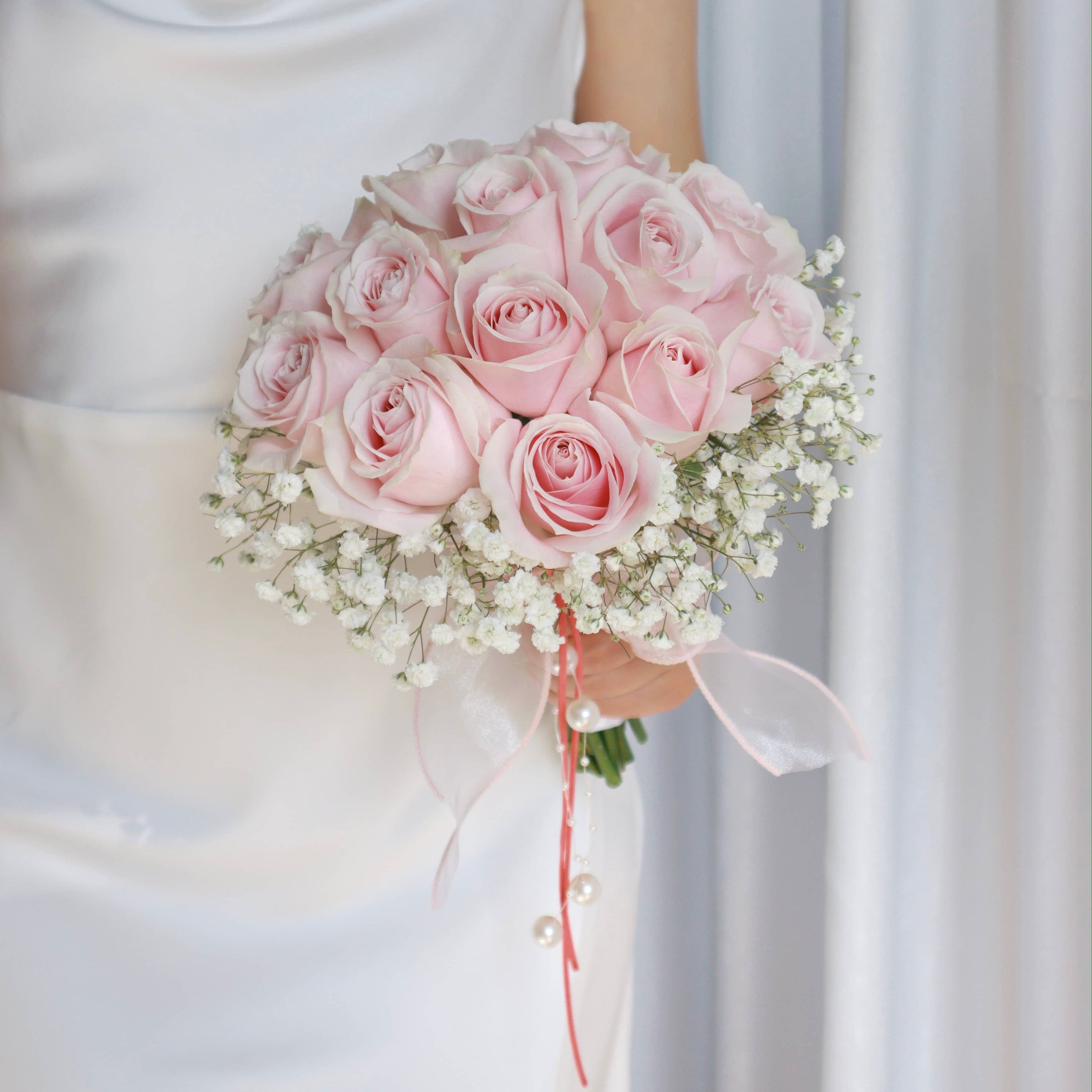 Pink Rose and Baby's Breath Bridesmaid Bouquets