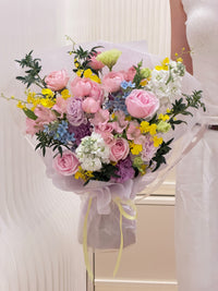 Pastel Sunshine bouquet with pink roses, yellow Oncidium orchids, lavender lisianthus and blue oxypetalum in Singapore